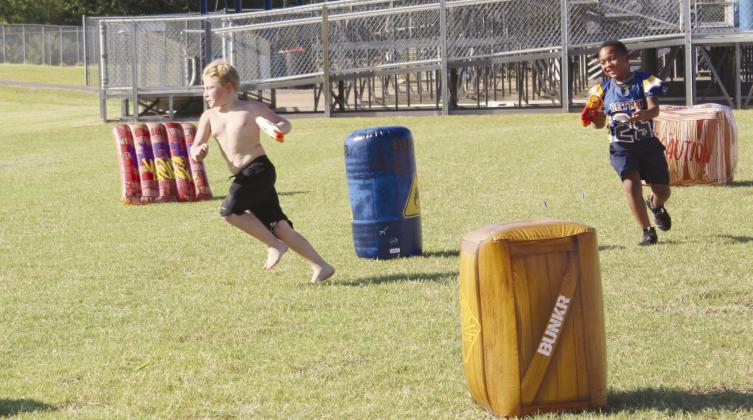 Aiden McCullah and Jeremiah Butts, both 8 and from Bethel, have fun in the Nerf Obstacle Course, a fund-raiser for Bethel Wrestling at the Bethel High School Blue &amp;amp; Gold Bash. Countywide &amp;amp; Sun/Natasha Dunagan