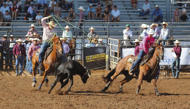 Stephen Wickerd of Shawnee and Cade Ferguson of Cloncurry, Queensland, Australia, team up for the International Finals Youth Rodeo on the morning of July 10 at the Heart of Oklahoma Expo Center.
