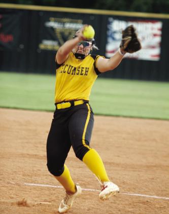 Tecumseh junior Embrie Smith aims her pitch before slinging it past home in the season-opening game against Prague on Aug. 12. The Lady Savages won, 10-7. Natasha Dunagan, Countywide &amp;amp; Sun