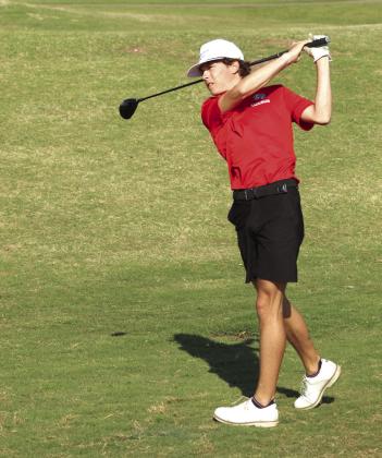 McLoud senior Boyd Hamby drives to the third hole at FireLake Golf Course on April 9. This is the first year for McLoud High School to offer golf.