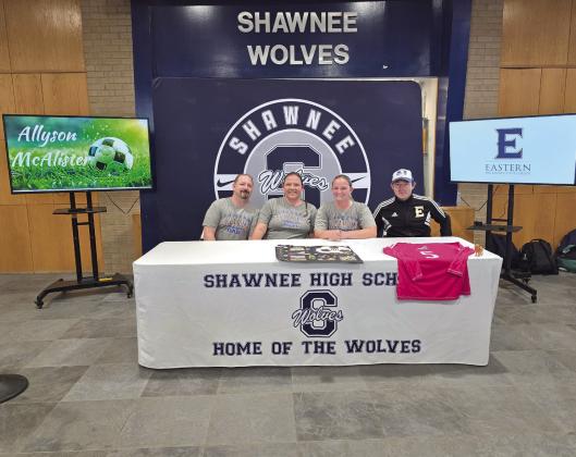 Shawnee student Allyson McAlister, third from left, with her parents and a coach, signed a letter of intent with Eastern Oklahoma State College for soccer on April 30. Photo courtesy of Amanda Johnson