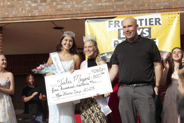 Jalee Meyers was crowned Miss Frontier Days and received a $500 scholarship check from the Tecumseh Chamber of Commerce, presented by the pageant’s premiere sponsor Tecumseh Public Schools on Sept. 28. Shown, from left, are Meyers, 2023 Miss Frontier Days Aleigha McCullough, and TPS Superintendent Robert Kinsey. Countywide &amp; Sun/Natasha Dunagan