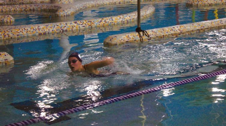 Shawnee sophomore Harlee Bullard competes in the Girls 100 Yard Freestyle. Coach Valarie Colburn said Bullard and senior Dalaney Uranga competed in the event after joining the swim team this year.