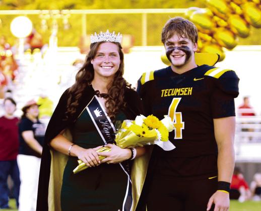 Tecumseh senior Katie Overstreet poses with Braxton Meier after she was crowned Queen during the Tecumseh High School Fall Homecoming ceremony before the football game with McLoud on Sept. 20. Countywide &amp; Sun/Natasha Dunagan