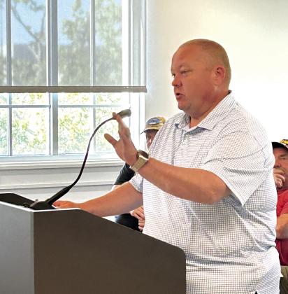 Oklahoma State Rep. Dell Kerbs addresses the County Commissioners after listening to residents from both sides of the proposed homeless facility to be located between McLoud and Harrah just off 29th Street.