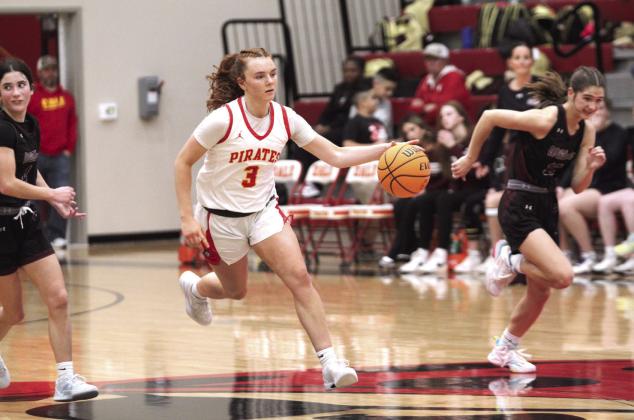 Dale junior Skylar Anderson runs the ball up court during the fourth quarter of the Dec. 20 home game with Cashion. The Lady Pirates won, 48-37.