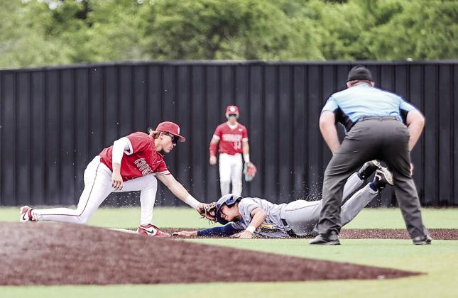 NRC's Hunter Bertram tagged out Bethel's Ryder Davenport as he tried to steal second base on April 10. NRC won the matchup 10-0. Photos Courtesy of Gowin Photography