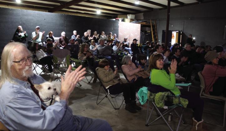 The crowd applauds a performance during Songwriter Night at Music Unlimited on Jan. 3. This event began in July 2022, according to host Kevin Hall, and had to be put on hold after the April 19, 2023 tornado damaged the warehouse.