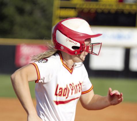 Dale's Heartly Snyder dashes to second base after hitting a double.