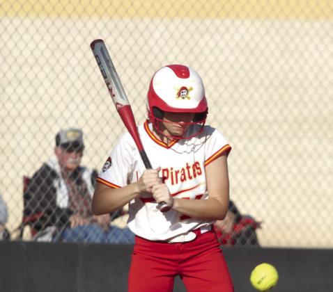 Dale senior Kinsley Hill keeps an eye on the ball but holds her swing before walking.