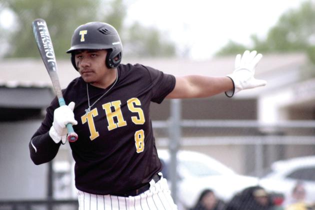 Tecumseh senior Kadyn Prado signals to his teammate to wait to steal home before hitting a double and sending two of them across home plate. Natasha Dunagan, Countywide &amp; Sun
