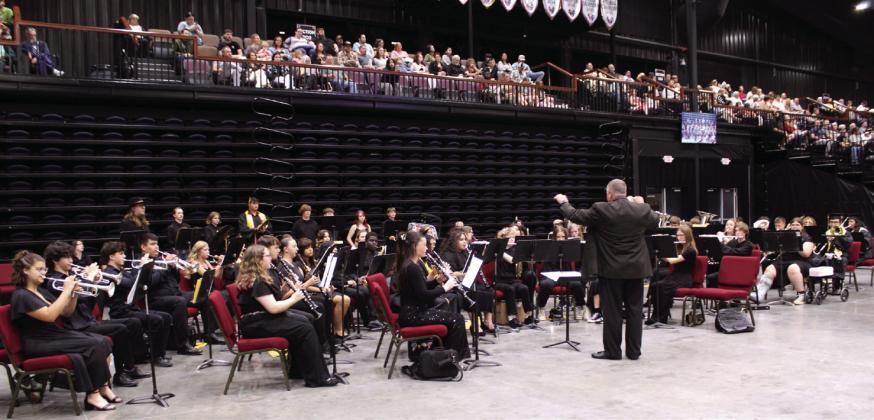 The Tecumseh Savage Pride Band, conducted by Band Director John Outon, plays 'A Vast Future' during graduation, held at FireLake Arena on May 20. This piece was commissioned to celebrate the 250th Anniversary of the United States and was performed at the State Capitol by the bands from Tecumseh, North Rock Creek and Meeker on May 12, according to a Facebook post by State Senator Shane Jett that day. Natasha Dunagan, Countywide &amp;amp; Sun