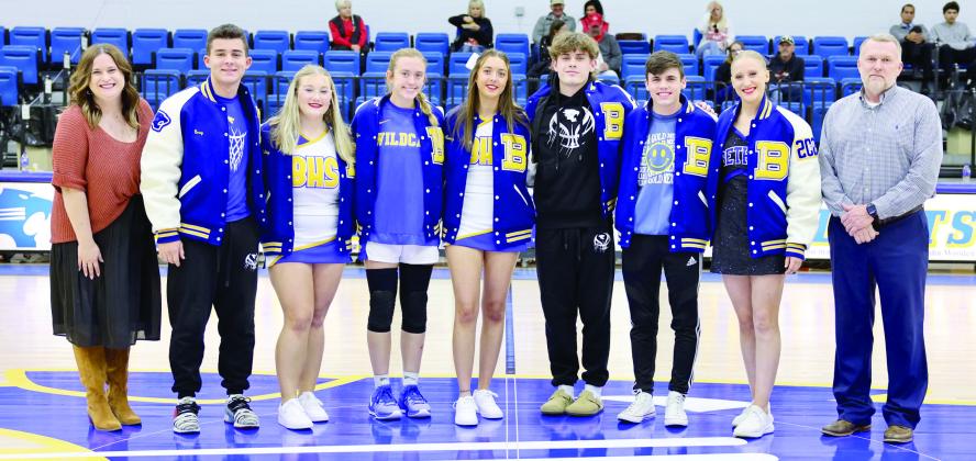 First United Bank sponsored and presented the top ten percent of the Bethel High School Senior class with Academic Letter Jackets at the home game Tuesday, Dec. 6. Pictured from left are Amanda Johnson with First United, Bray Bussell, Riley Bowie, Brooklyn Duff, Casey Brock, RJ Morris, Luke Drew, Marlee Affentranger, and High School Principal Jeremy Stewart. Photo courtesy of Richelle Treece