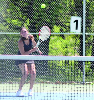 Tecumseh senior Jalee Meyers returns the ball during the tennis match against Byng. Jessica Jones, THS Intern, Countywide &amp;amp; Sun