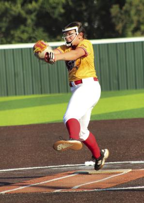 Dale senior Boo Herber goes airborne as she winds up her pitch in the Dale Fast Pitch Festival game against Plainview on Sept. 11.