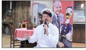 Nick Waters with American Storytellers, LLC, tells the story of Clarence 'Ducky' Nash, the voice of Donald Duck for 50 years, on June 8 at the McLoud Museum and Historical Society. Presented by the McLoud Public Library, Waters told how Nash was born in Watonga, OK, where he imitated the animals on their farm as a child. Nash worked as a milkman before being hired by Disney.