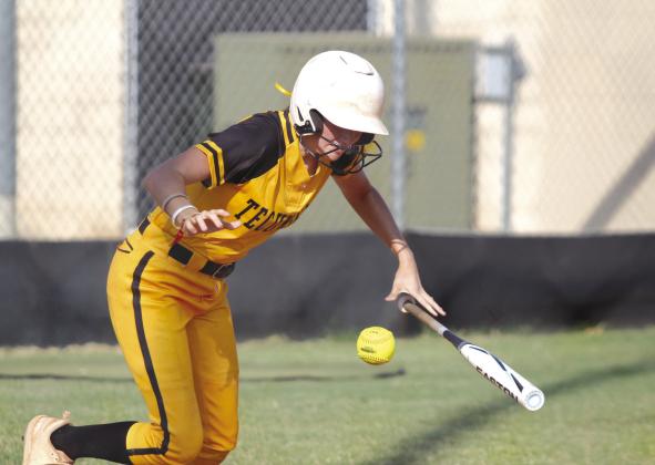 Tecumseh sophomore Madison Gray thows her bat down to run after a hit in the fourth inning of the Aug. 13 game with Cleveland.