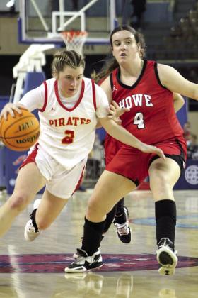 Dale senior Makenzy Herman drives toward the basket during the third quarter of the Class 2A State Championship game against Howe on March 11 at the State Fairgrounds Arena. The Dale Lady Pirates won state, 48-23. Before this, the Lady Pirates have won seven state basketball championships, with the last one being in 2010.
