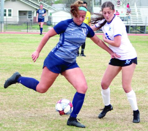 Shawnee's Kalieo Citizen defends the ball as she tries to move it down the field during the home game with Sapulpa on April 4. The Lady Wolves lost that game, 0-8, but they won the next game against Del City, 1-0, April 7. The Wolves won both their games, 2-0 and 3-2. Countywide &amp; Sun/Natasha Dunagan