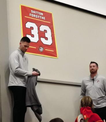 The retired #33 is revealed to the crowd.