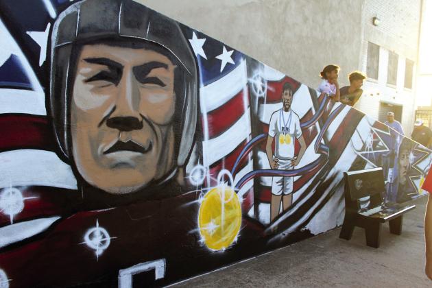 A mural honoring Jim Thorpe was painted by Nicholas Blanchard along the ramp to the bleachers at Jim Thorpe Stadium, and a ribbon-cutting ceremony was held as part of Shawnee Public Schools Jim Thorpe Night before the home football game on Sept. 27. Countywide &amp; Sun/Natasha Dunagan