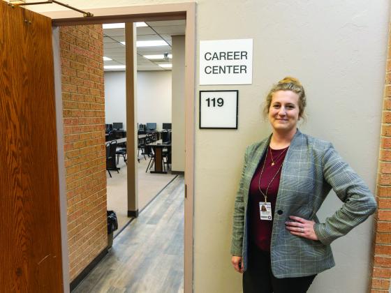 Research Librarian Ashley Bagwell stands beside the recently opened Career Center located in the David L. Boren Library on Seminole State College’s campus. Photo provided by SSC