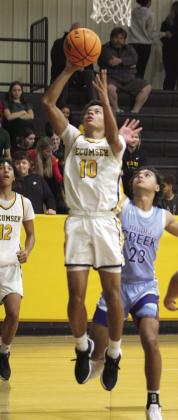 Tecumseh’s Jekhi Owens makes a bucket at the end of the fourth quarter.