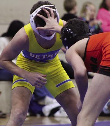 Bethel’s Maverick Wingo gets a hand in the face from his Konawa opponent during the wrestling meet on Jan. 25. Bethel also faced Prague for the Wrestling Homecoming and Senior Night meet.