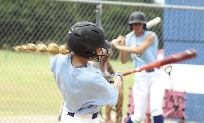 Bethel junior Hailey Hanmer makes contact at bat during the scrimmage with Harrah on Aug. 6. The Lady Wildcats began their season at home against Newcastle on Mon., Aug. 10. Photos by Natasha Dunagan, Countywide &amp;amp; Sun