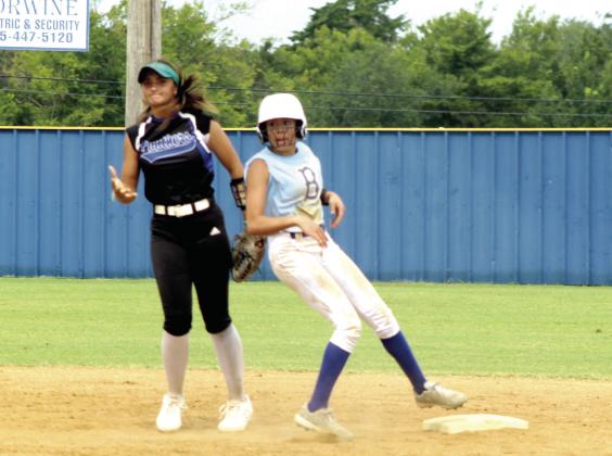 Bethel's Landyn Clark steps back on second after trying to steal third.
