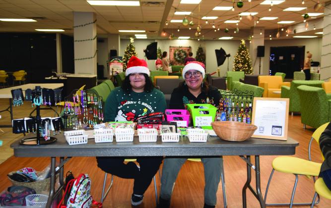 Vendor booths were set up inside the student union including this one by “Arts &amp; Crafts by CJ” selling Native beaded jewelry and accessories. If you missed the event, you can find her work on her Facebook page by the same name.