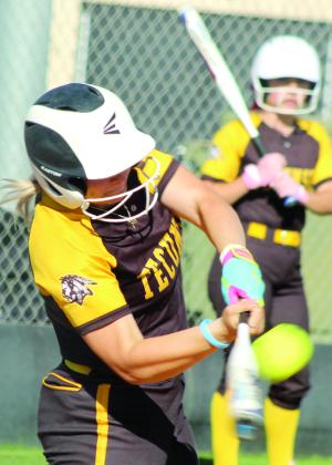 Tecumseh senior Steeli Mitchell smacks a single during the second inning of the home game against McLoud on April 7. The Lady Savages won 2-0. Natasha Dunagan, Countywide &amp;amp; Sun