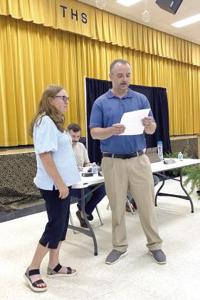Board President, Iva Bingham swears in Stephen Kingham to fill the last open (Ward 4) seat at the May Tecumseh School Board meeting. Julie Talton, Countywide &amp;amp; Sun
