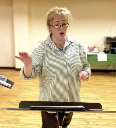 Dr. Ada Hunter directs the Peace and Praise Choir at practice. Julie Talton, Countywide &amp;amp; Sun