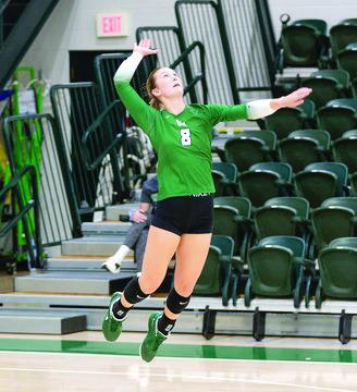 OBU's Rylee Unruh serves the ball . Photo Provided