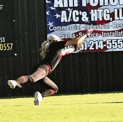 North Rock Creek’s Aubree Shivelhood dives for the catch in the game against Tecumseh, Monday, Sept. 16. NRC took the 2-1 win over the Lady Savages. Photo courtesy of Gowin Photography