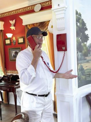 Moore exclaims, 'This is the red phone, hotline to heaven!'