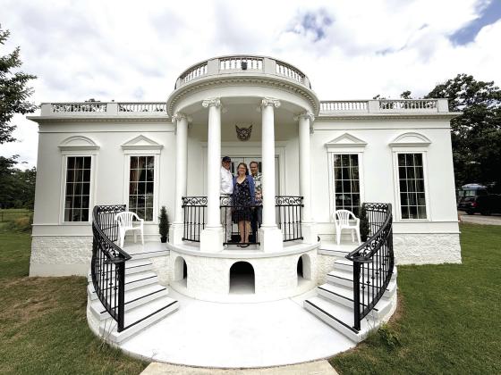 Pastor Ed Moore, his wife Sandy (both of Shawnee) and Pastor Dave Anderson (of Klamath Falls, OR) pose at the Children's White House, located on a shore of Shawnee Twin Lakes. Julie Talton, Countywide &amp;amp; Sun