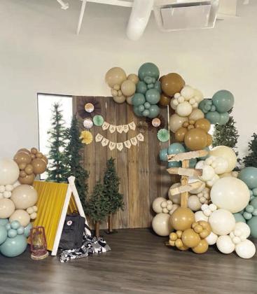 The entryway at Tecumseh Early Childhood Center has been transformed into a camper’s dream. This set up is sure to make first day of school photos extra adorable.