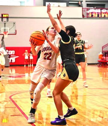 Kadence Munn put up a tough shot for North Rock Creek in the semi-final game of the Washington Tournament.