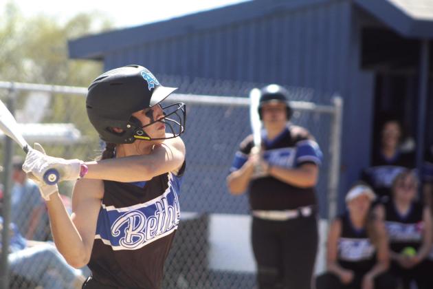 Bethel freshman Layla Menhusen prepares to hit a double during the third inning of the Mounds game on April 13. Played at Bethel in the Dale Festival, the Lady Wildcats won this game, 12-2, but lost their next three games with Prague, Shattuck and Morrison.