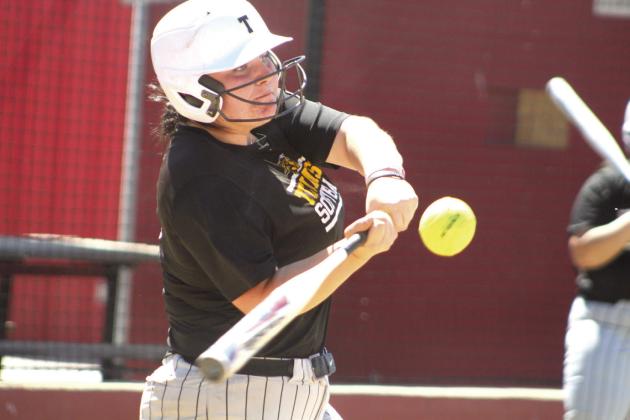 Tecumseh’s Aubre Peacock takes her turn at bat in the third inning of the Dale Festival game with Silo on April 13. Peacock hit a home run in the second inning. Held at Dale, the game was won by the Lady Savages, 11-9. Later that day, they lost to Southmoore, 6-10.