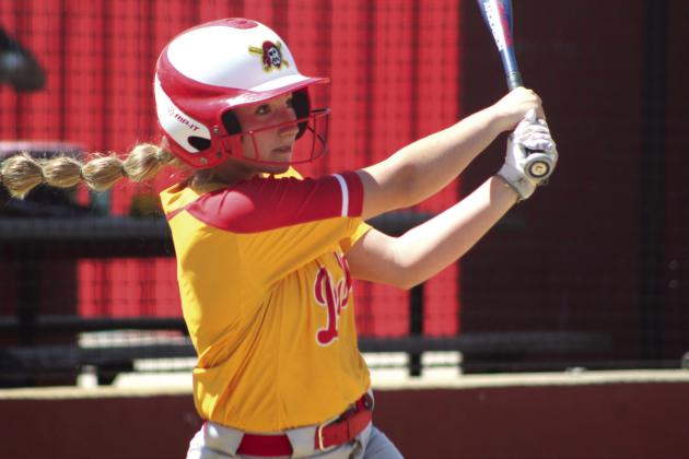 Dale’s Kinsley Hill hits a triple in the third inning and drives in three RBIs during the Dale Festival game with Silo on April 14. The Lady Pirates won, 12-7. Countywide &amp;amp; Sun/Natasha Dunagan