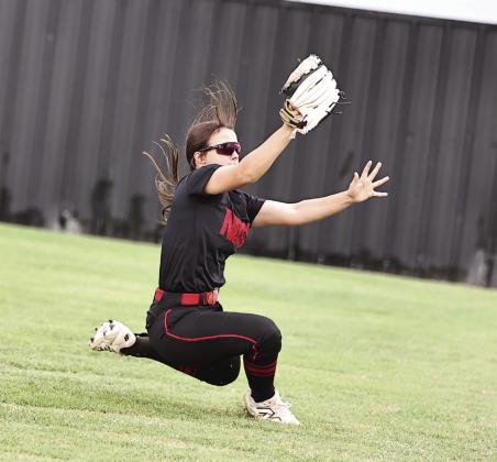 North Rock Creek's Jaden Clifton makes a sliding catch for the out against Bethel in the McLoud Tournament on Sept. 5.