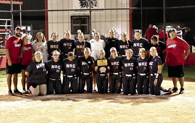 North Rock Creek Softball team took the championship plaque in the McLoud softball tournament. They beat Jones in the semi finals, 8-1, and McLoud in the finals 15-5.
