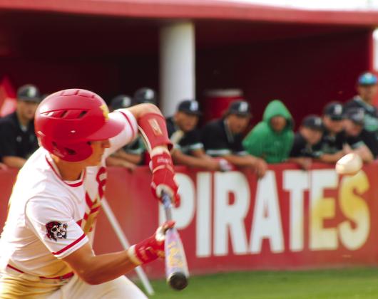 Dale senior Andrew Collins gets a hit before walking at the April 17 home game against Jones. The Pirates won 4-2. Natasha Dunagan, Countywide &amp; Sun