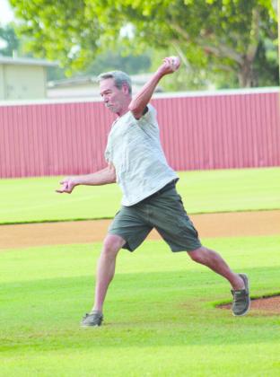 Dale Alum Joe Mortimer, who played on the 1979 State Championship Team, throws the first pitch for the Aug. 18 home game. Countywide &amp; Sun/Natasha Dunagan
