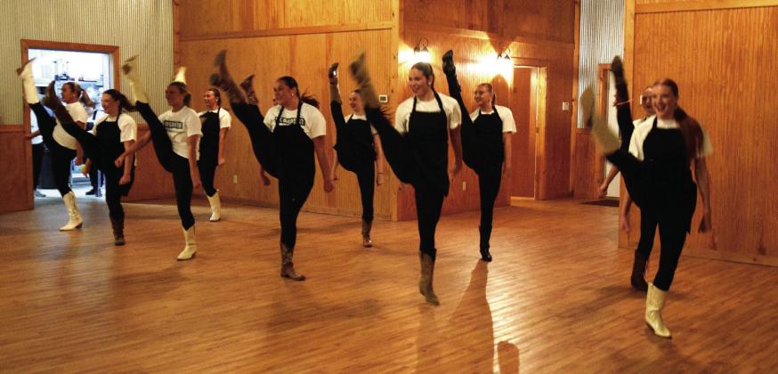 The OBU Dance Team posed as wait staff and opened the dinner with a surprise dance. Julie Talton, Countywide &amp; Sun