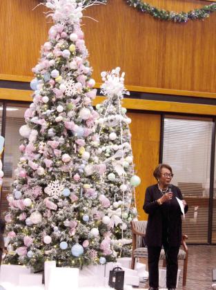 Salvation Army Women's Auxiliary Angel Tree Coordinator Robbie Foxx speaks during the Angel Tree Kickoff event at Sovereign Bank in Shawnee on Nov. 20. Co-Captains Leanna and Thomas Marion also spoke during the event, and the Will Rogers Elementary Choir sang Christmas songs. In addition to the bank, there are also Angel Trees at Walmart, Lowe's, Higginbotham Bros. &amp; Co., and Walls Bargain Center. L. Marion said there are 520 Angel Tree children who can be "adopted" this year.