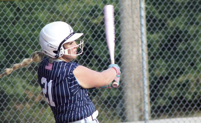 Asher senior Josey Milburn dings a double in the first inning of the Aug. 20 home game against Carney.